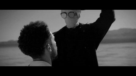 Masked Man Stabbing A Guy In The Face GIF