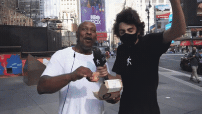 Masked Man With Food Box At HBO Max Sign GIF