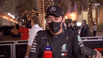 Masked Man With Mercedes Hat And Microphone Talks To Sky Sports GIF
