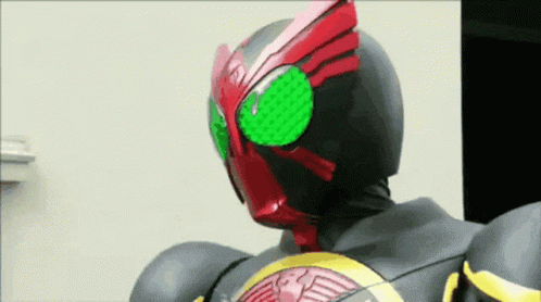 Masked Rider Helmet With Green Eyes GIF