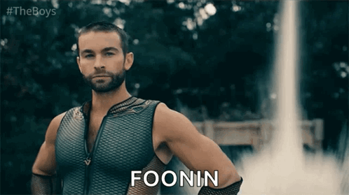 Masked Superhero Sitting At Computer GIF