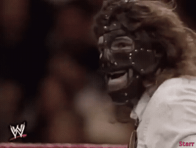 Masked Wrestler Sitting In Ring With Starr Logo GIF
