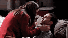 Massimo Cradled Laura Couch Kiss 365 Dyas GIF