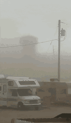Massive Dust Storm Covering Skyscrapers GIF