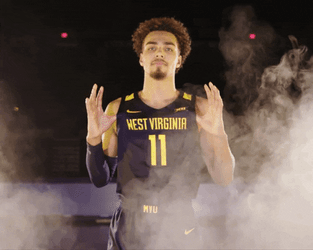 Matthews Mountaineers Player Showing Off His Jersey Number GIF