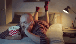 Max Gawn Watching In Bed Eating Popcorn GIF