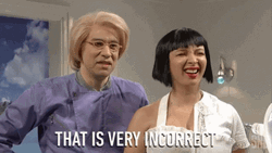 Maya Rudolph Laughing While Shaking Her Head GIF