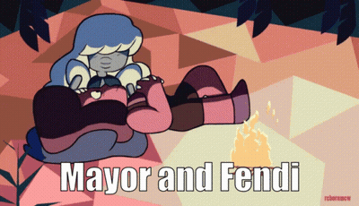 Mayor And Fendi Laying By A Fire GIF