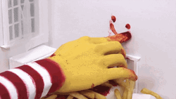 McDonald Draws Smiley Face Using Ketchup GIF