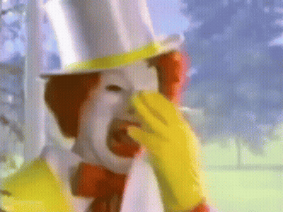 Mcdonald 'S Clown Covering His Nose With His Hand GIF