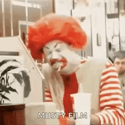 McDonald's Clown Eating Hamburger And Drinking Soda GIF