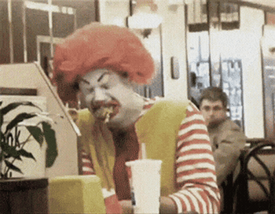 McDonald's Clown Eating Hamburger GIF