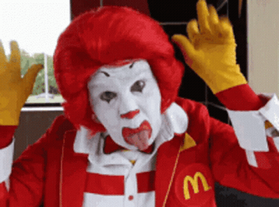 McDonald's Clown Sticking Out Tongue In McDonald's Jacket GIF