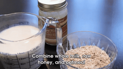 Measuring Cup Of Milk Next To Jar Of Honey And Oatmeal GIF
