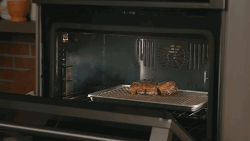 Meat Cooking On Rack In Oven GIF