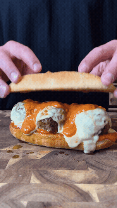 Meatball Sandwich With Sauce GIF