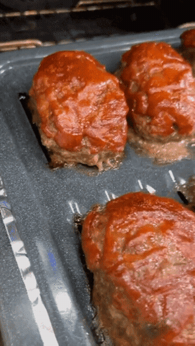 Meatballs Covered In Tomato Sauce Ready To Bake GIF