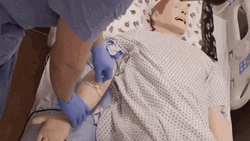 Medical Student Practicing Injection GIF