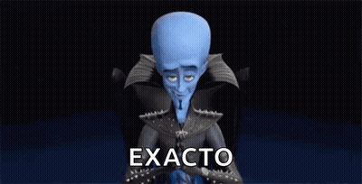 Megamind Cartoon Character Sitting With Folded Hands GIF