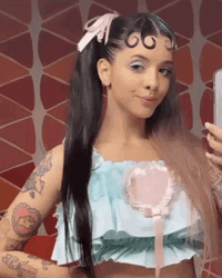 Melanie Martinez Sticking Out Her Tongue GIF