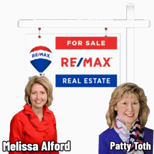 Melissa Alford And Patty Toth Pose In Front Of A For Sale Sign GIF