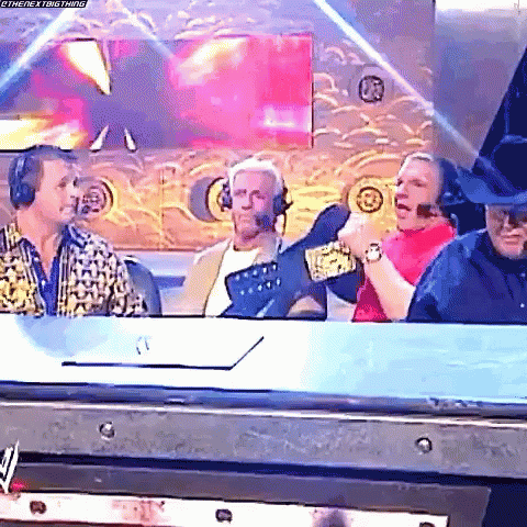 Men At Table With Championship Belt GIF