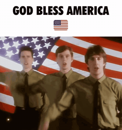 Men Before American Flag Saying God Bless America GIF