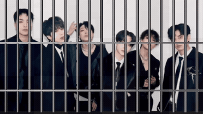 Men Behind Bars In Jail Cell GIF