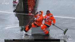 Men Brushing Off The Flooding GIF