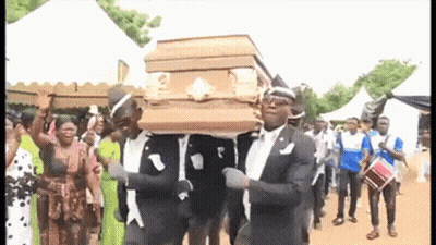 Men Carrying Coffin While Dancing GIF