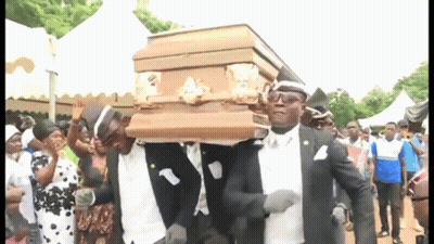 Men Carrying Coffin While Dancing GIF