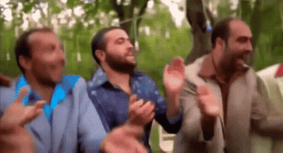 Men Clapping In A Park GIF