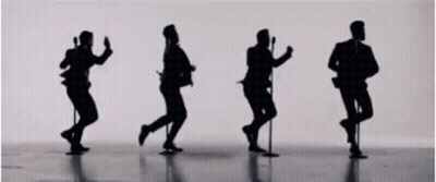Men Dancing And Singing Into Microphones GIF