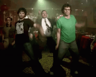 Men Dancing Dark Room, One In Green Shirt GIF