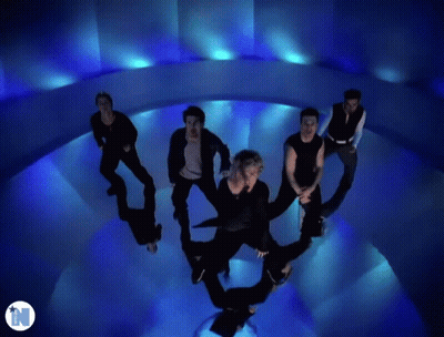Men Dancing In Blue Room With N GIF