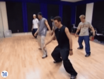Men Dancing In Dance Studio With Letter N GIF