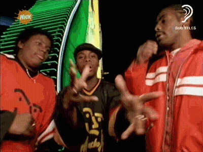 Men Dancing In Front Of Nickelodeon Sign GIF