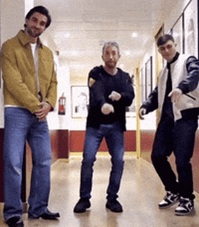 Men Dancing In Hallway GIF