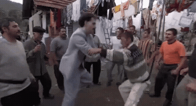 Men Dancing In Street GIF