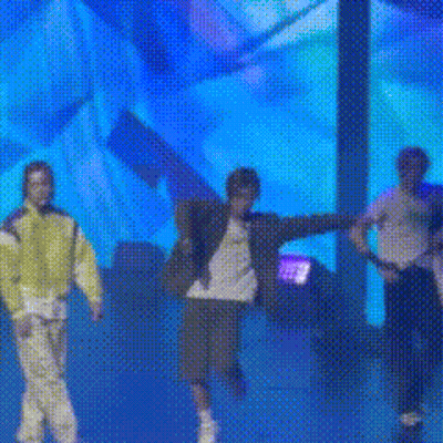 Men Dancing On Blue Stage GIF