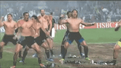 Men Dancing On Soccer Field With Seven Sign GIF