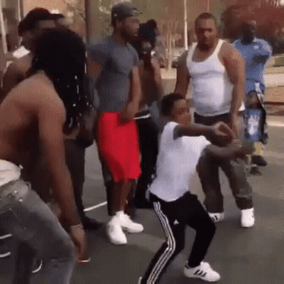 Men Dancing On Street One Wearing Adidas Shoes GIF