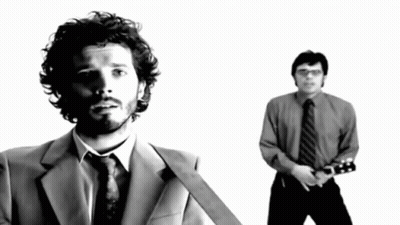 Men Dancing, One In Green Shirt GIF