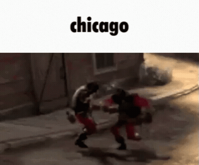 Men Fighting On Chicago Sidewalk GIF