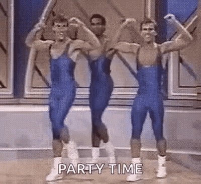 Men Flexing Muscles In Gym GIF