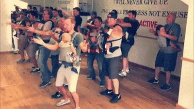 Men Holding Babies While Dancing GIF