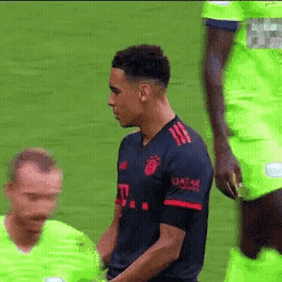 Men In Blue And Green On Soccer Field GIF