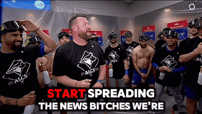 Men In Blue Jays Shirts Standing Together GIF