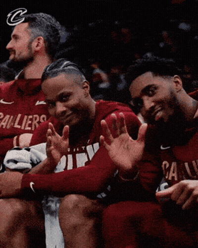 Men In Cleveland Cavaliers Jerseys Sitting GIF