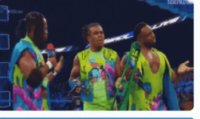 Men In Colorful Shirts On Stage GIF